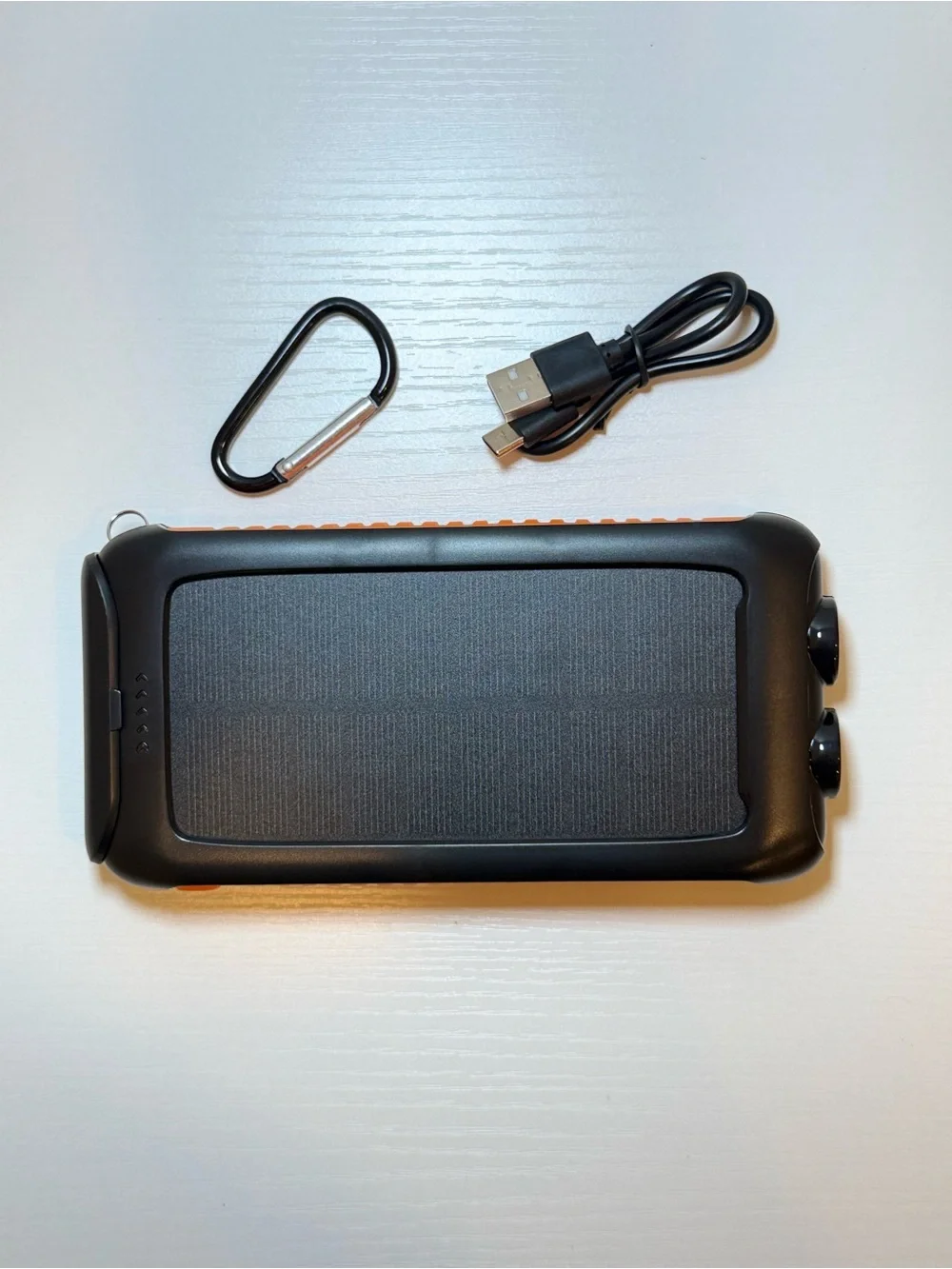 Portable Solar Power Bank in Black and Orange